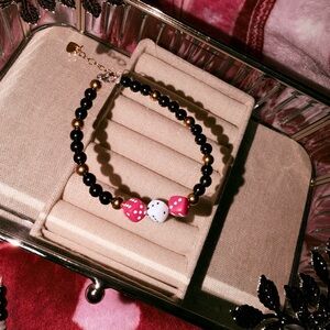 Pretty lucky Black and Gold Beaded bracelet with Pink and White Dice